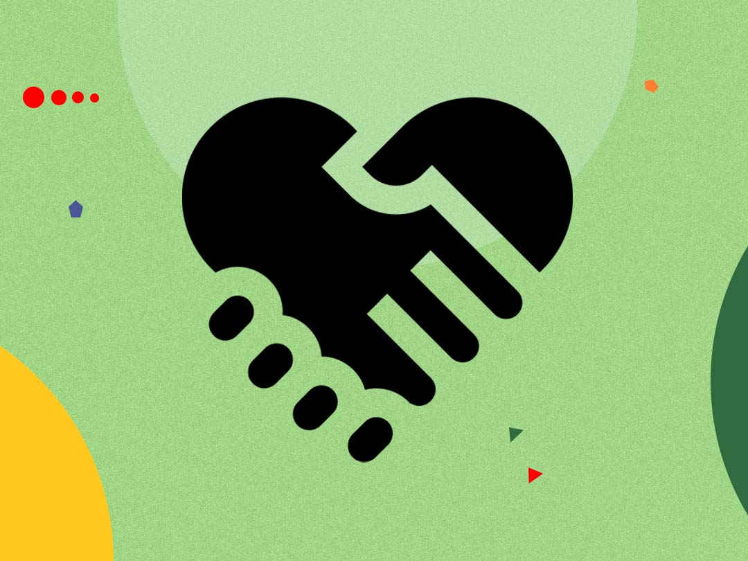 Two hands clasped in the shape of a heart.